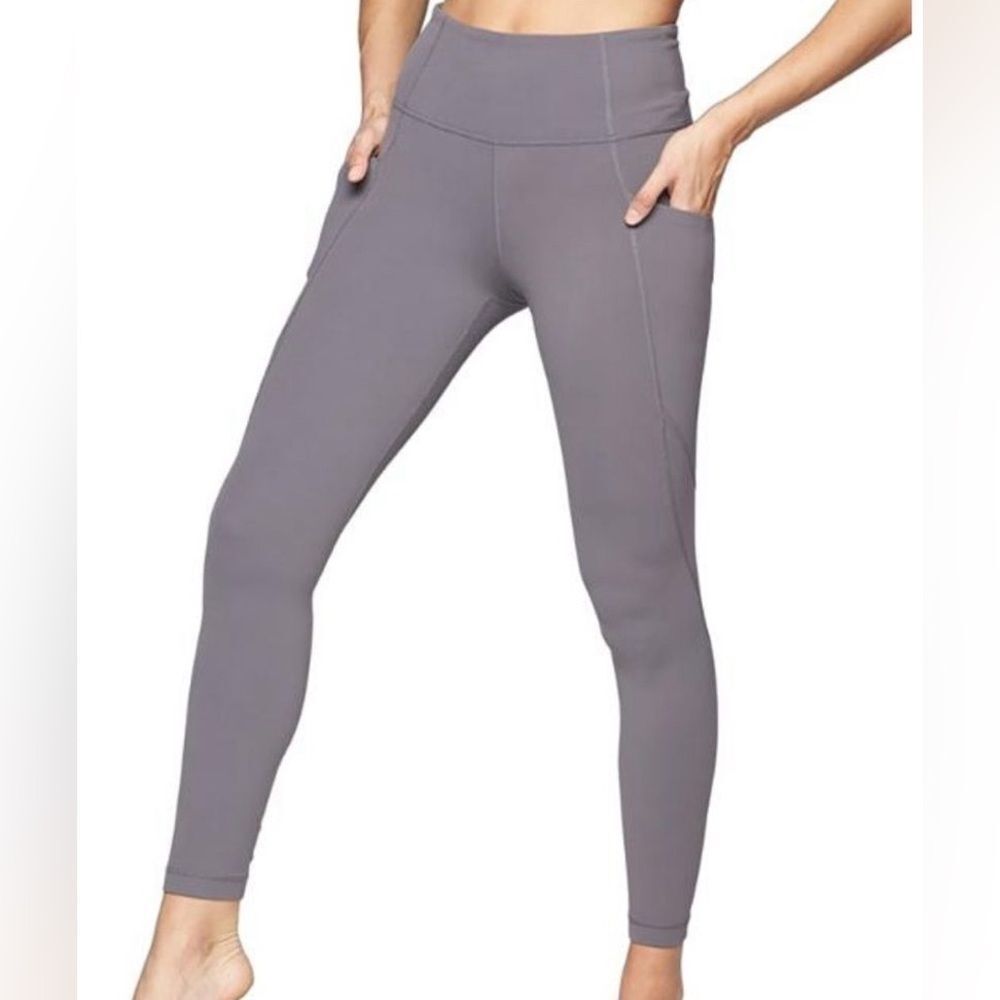 Athleta Stash Pocket Salutation Tights size S